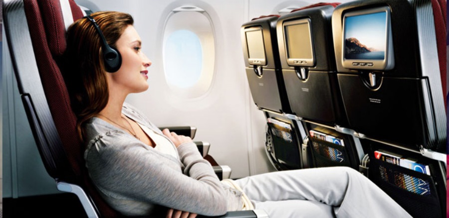 Woman-Sitting-In-The-Airplane2